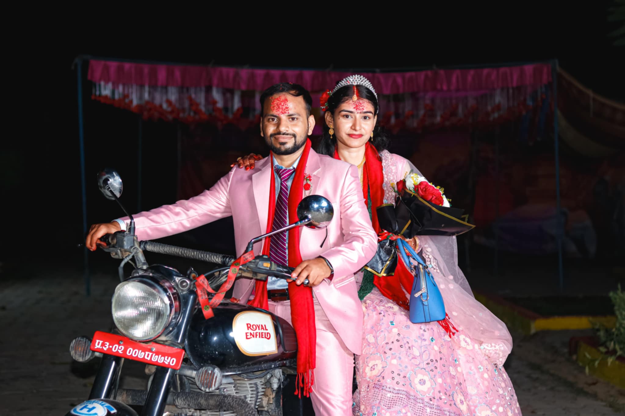 Traditional Nepali wedding ceremony with bride and groom in traditional attire